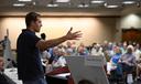 Conor Lamb speaks to the crowd at a town hall-style event organized by progressive groups at Central Penn College, Sunday, June 22, 2025, in Enola, PA.
