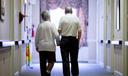An older couple in the hall of a nursing home in Easton, PA.