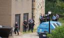 Police gather at the Villanova University campus where an active shooter was reported Thursday, Aug. 21, 2025, in Villanova, Pennsylvania