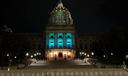 The Pennsylvania Capitol building illuminated in teal for Sexual Assault Awareness Month.