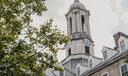 The bell tower of Old Main on Penn State's campus.