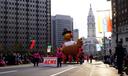 Handlers walk the turkey balloon down the Benjamin Franklin Parkway in Philadelphia during the Thanksgiving Day Parade.