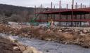 Stony Creek flows past construction of the new Antietam School District elementary school in January 2026.