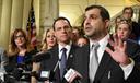 Then-state Rep. Mark Rozzi (D., Berks) speaks at a news conference in the Pennsylvania Capitol in October 2018. He is flanked by then-Attorney General Josh Shapiro, lawmakers, and abuse victims.