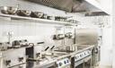 A stock image of a restaurant kitchen.