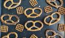Pretzels laid out on a baking sheet