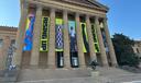 Banners for the "Rising Up: Rocky" exhibition hang outside of the Philadelphia Museum of Art in Philadelphia, Wednesday, April 22, 2026.
