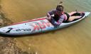 Amanda Parezo rides a paddleboard