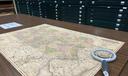 A map of Pennsylvania and a magnifying glass