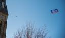 A VotesPA.com banner is flown behind a plane over downtown Erie on Election Day 2022.