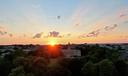 Sunset over Old Main on Penn State's campus in State College, Pennsylvania.