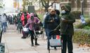 Some sites in Bucks County, Montgomery County, and Philadelphia (where voters are shown here, at Tilden Middle School) saw long lines of voters who wanted to request a mail ballot without having to risk U.S. Postal Service problems.
