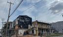 The three-story apartment complex at 501 North 8th St. in Reading remained fenced off July 18 after the south wall collapsed.