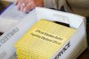 Workers sort mail ballots on Nov. 5, 2024, at Northampton County Courthouse in Easton, Pennsylvania.