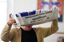 Workers sort mail ballots on Nov. 5, 2024, at Northampton County Courthouse in Easton, Pennsylvania.