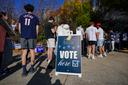 People wait in line to vote Nov. 5, 2024, at the Banana Factory in Bethlehem, Pennsylvania.