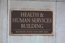 A placard outside the Pennsylvania Health & Human Services building in Harrisburg.