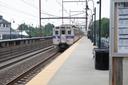 A SEPTA train approaches a station.
