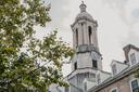 The bell tower of Old Main on Penn State's campus.