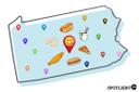 Illustration of Pennsylvania with select food items and location pins placed across the state.