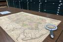 A map of Pennsylvania and a magnifying glass