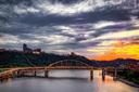 A panoramic view of a Pittsburgh bridge on a cloudy day