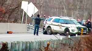 In a redacted video released by the Monroe County District Attorney’s Office, Christian Hall’s final moments are obscured. In unredacted footage obtained by Spotlight PA and NBC News, Hall is shown with his hands remaining in the air as troopers opened fire and struck Hall three times. In a redacted video released by the Monroe County District Attorney’s Office, Christian Hall’s final moments are obscured. In unredacted footage obtained by Spotlight PA and NBC News, Hall is shown with his hands remaining in the air as troopers opened fire and struck Hall three times.