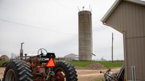 Radios and a microwave dish, installed on top of a farm silo, provide internet service to nearby homes.