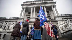 Trump supporters protest outside the Capitol building on Monday, Dec. 14. Twenty electors from across Pennsylvania gathered in Harrisburg today to cast their votes for Joe Biden.