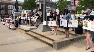 The 3/20 Coalition protests against police violence at the Centre County Government building.