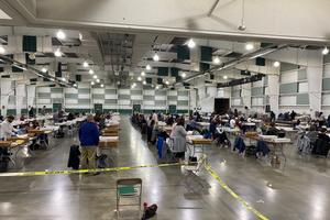 About 100 York County employees open and prepare mail ballots for counting after 8 p.m. Tuesday.