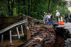 PA Gov. Josh Shapiro, U.S. Sen. Bob Casey, other officials, and first responders survey Bucks County flooding damage.