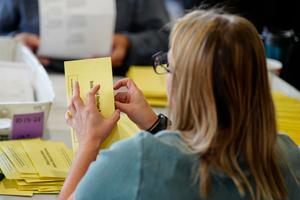 Workers sort mail ballots on Nov. 7, 2023, at Northampton County Courthouse in Easton, Pennsylvania.