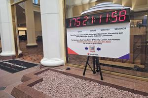 An installation at the Pennsylvania Capitol shows how many days have passed since the House passed gun control bills.