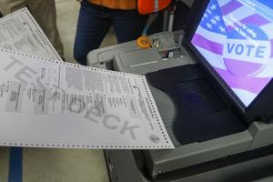 Test ballots were fed into voting machines ahead of Election Day 2022 in Chester County.