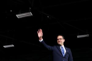 Incoming Democratic Pennsylvania Gov. Josh Shapiro waves to a crowd on the night of his election.