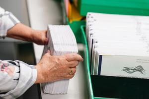 Mail-in ballots are sorted and counted at Lehigh County Government Center in Allentown. 