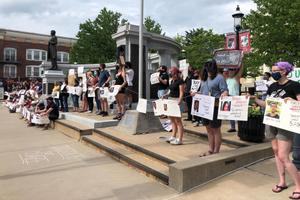The 3/20 Coalition protests against police violence at the Centre County Government building.