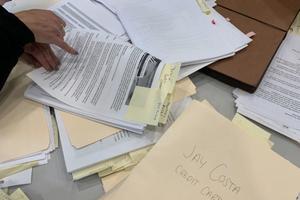 Piles of campaign finance records.