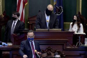 Lt. Gov. John Fetterman (center) confers with Senate Secretary Megan Martin (right), as Sen. Jake Corman (front, center), takes over the session to conduct a vote to remove Fetterman from residing over the session in Harrisburg on Tuesday, Jan. 5, 2021. Bobby Maggio, Fetterman’s chief of staff, stands to the left. Lt. Gov. John Fetterman (center) confers with Senate Secretary Megan Martin (right), as Sen. Jake Corman (front, center), takes over the session to conduct a vote to remove Fetterman from residing over the session in Harrisburg on Tuesday, Jan. 5, 2021. Bobby Maggio, Fetterman’s chief of staff, stands to the left.