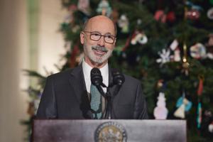 Pennsylvania Governor Tom Wolf, who will soon leave office, speaks at the Capitol in Harrisburg.