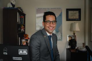 Rep. Tarik Khan in his district office. Rep. Tarik Khan in his district office.