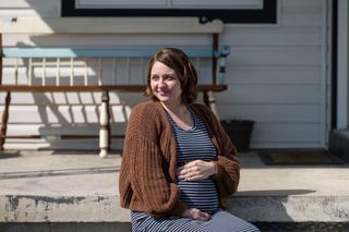 Jessie Larabee, who is pregnant, poses for a photograph outside her St. Marys home.
