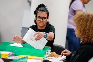 William Allen senior Liliana Delgado, of Allentown, opens and sorts mail-in ballots Nov. 8, 2022, at Lehigh County Government Center in Allentown, Lehigh County, Pennsylvania. William Allen senior Liliana Delgado, of Allentown, opens and sorts mail-in ballots Nov. 8, 2022, at Lehigh County Government Center in Allentown, Lehigh County, Pennsylvania.