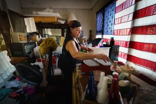 Sandra Huffman, shown here at her home in East Greenville, Pa., has been unemployed since April when she got sick while working a hospital cleaning job. She has been receiving money from the coronavirus assistance fund, but has struggled during a monthlong gap in benefits.