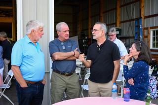 Gene Stocker, left, and Centre County Commissioner Steve Dershem, second from left, listen to residents during a neighborhood meeting in June to discuss PFAS, or "forever chemicals," water contamination. Gene Stocker, left, and Centre County Commissioner Steve Dershem, second from left, listen to residents during a neighborhood meeting in June to discuss PFAS, or "forever chemicals," water contamination.