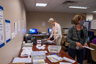 Erie County employees are seen here organizing mail ballots during the 2020 presidential election. “We would have had to go to county taxpayers several times without this,” Erie County Executive Director Kathy Dahlkemper wrote of the grant money. Erie County employees are seen here organizing mail ballots during the 2020 presidential election. “We would have had to go to county taxpayers several times without this,” Erie County Executive Director Kathy Dahlkemper wrote of the grant money.