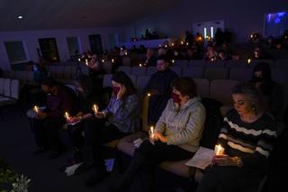 Attendees participate in a vigil for Christian Hall at Pleasant Valley Assembly of God in Brodheadsville. Hall was killed one year ago by Pennsylvania State Police.