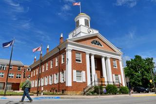 Bedford County's district attorney charged a man for firing a 12-gauge shotgun at civil rights marchers last August, striking one in the face. Bedford County's district attorney charged a man for firing a 12-gauge shotgun at civil rights marchers last August, striking one in the face.