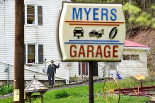John Myers, whose son shot at BLM activists in August, stands outside his home and garage. John Myers, whose son shot at BLM activists in August, stands outside his home and garage.